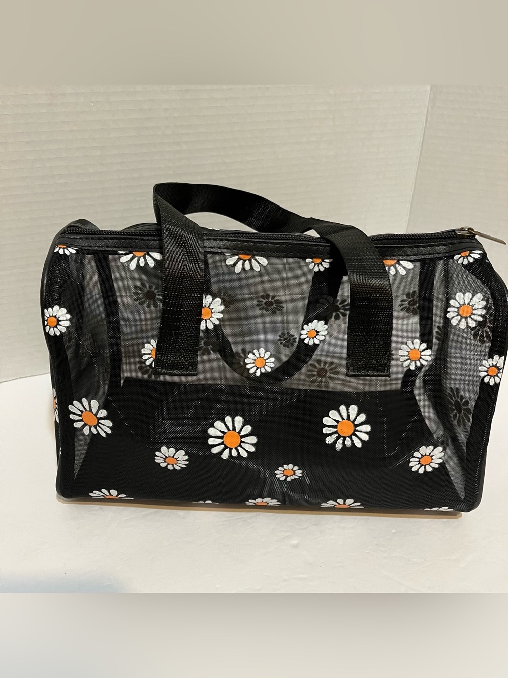 Black Daisy Print Mesh Tote Bag with Orange Accents